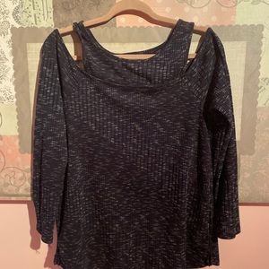 Woman shoulder cut blouse